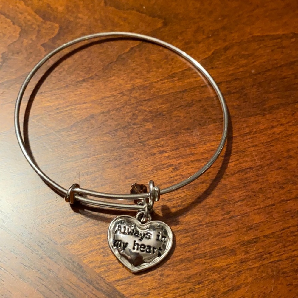 Bracelet stating “always in my heart”